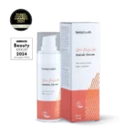Een fles Hemptouch - Skin Perfection - CBD Azelaic Serum voor gezicht (30ml) met doosje, met daarop de veganistische formule en de 2024 award badges.