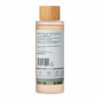 A bottle of Renova – Massage Oil with CBD (100ml) with a wooden cap.